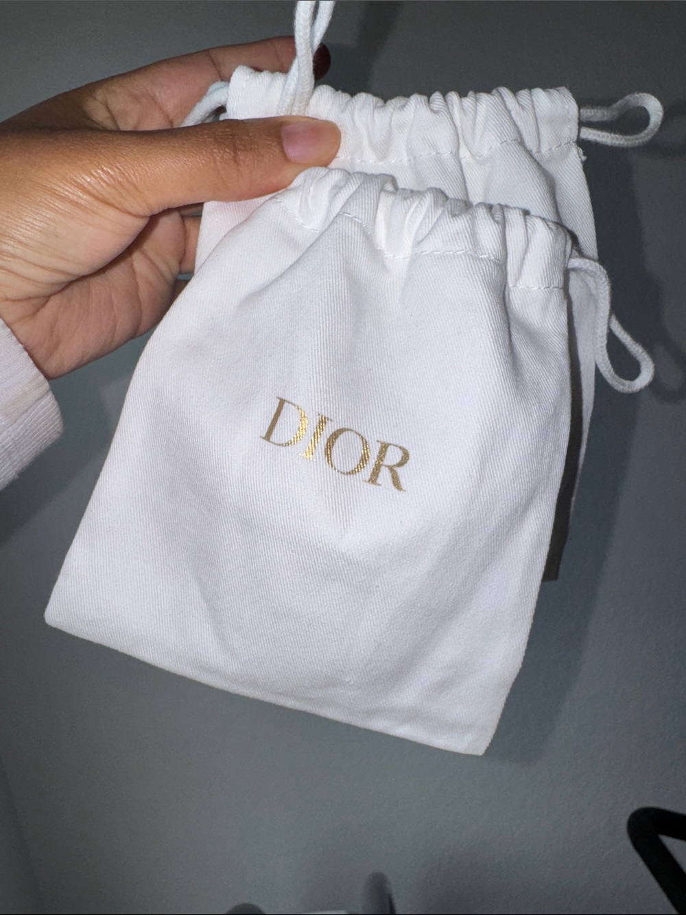 Dior White Drawstring Jewelry Pouch with Gold Logo Print